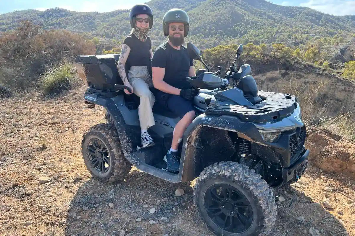 Couple enjoy they ride on a quad with Hondon Events